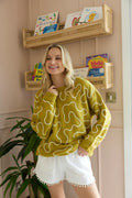 Twist of West Knitted Sweater