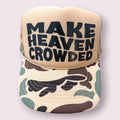 Make Heaven Crowded Black Glitter Puff Vinyl On A Duck Camo and Tan Trucker Hat